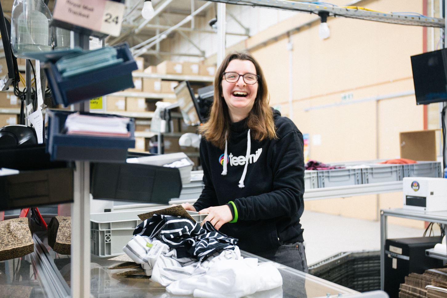 One of our suppliers employees producing a t-shirt